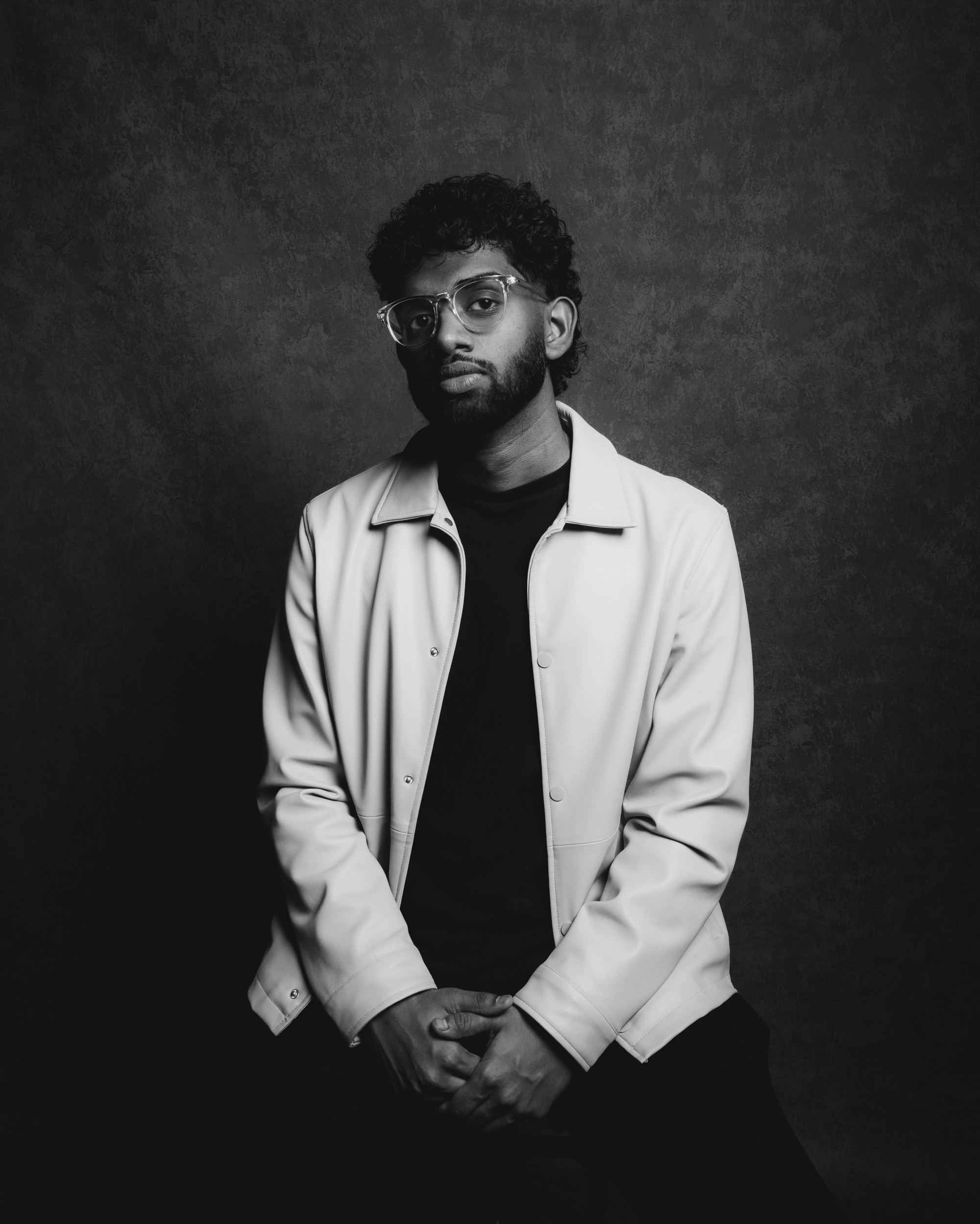 Black-and-white portrait of DJ Clickz