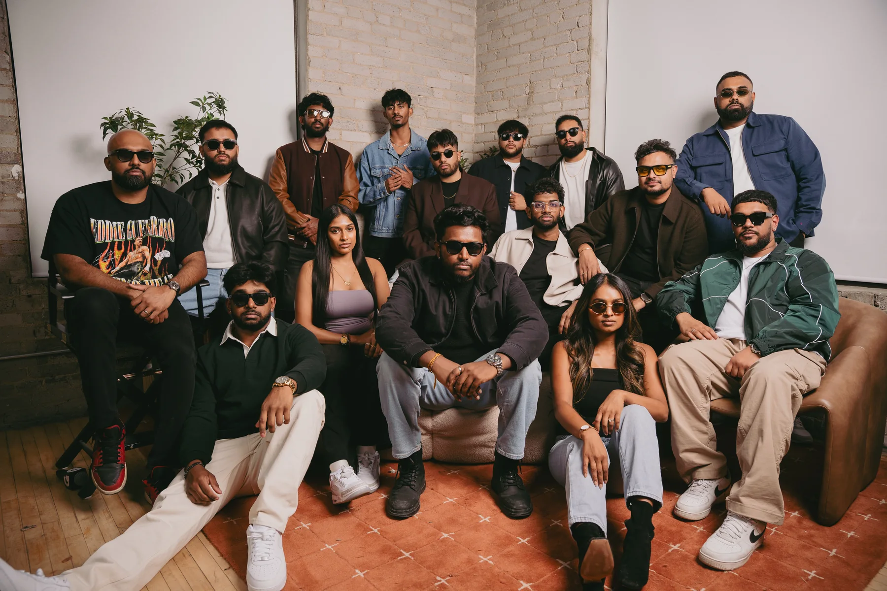 DJ Clickz with a group of guests